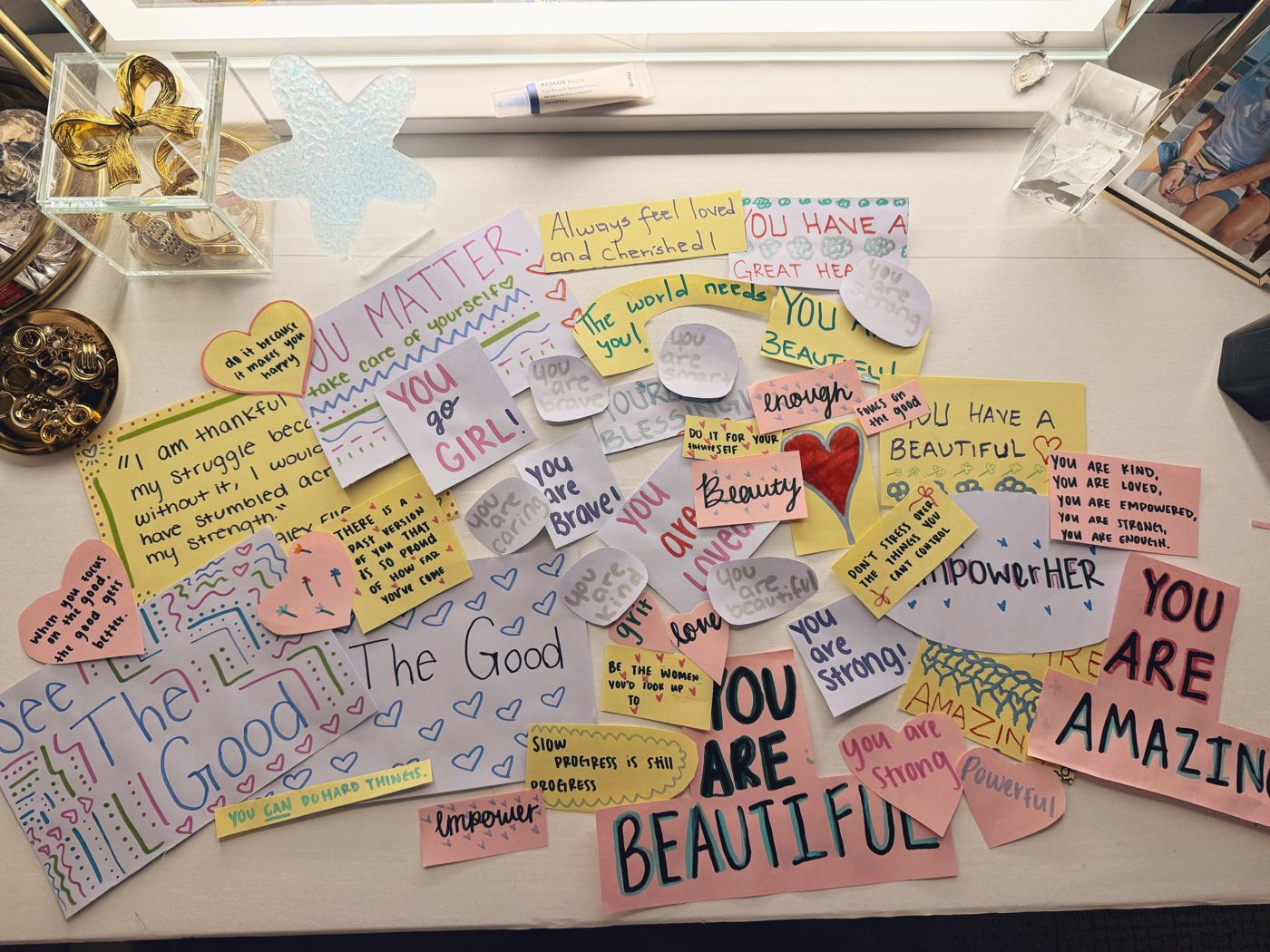 Handwritten affirmation notes reading You are beautiful, You matter and more